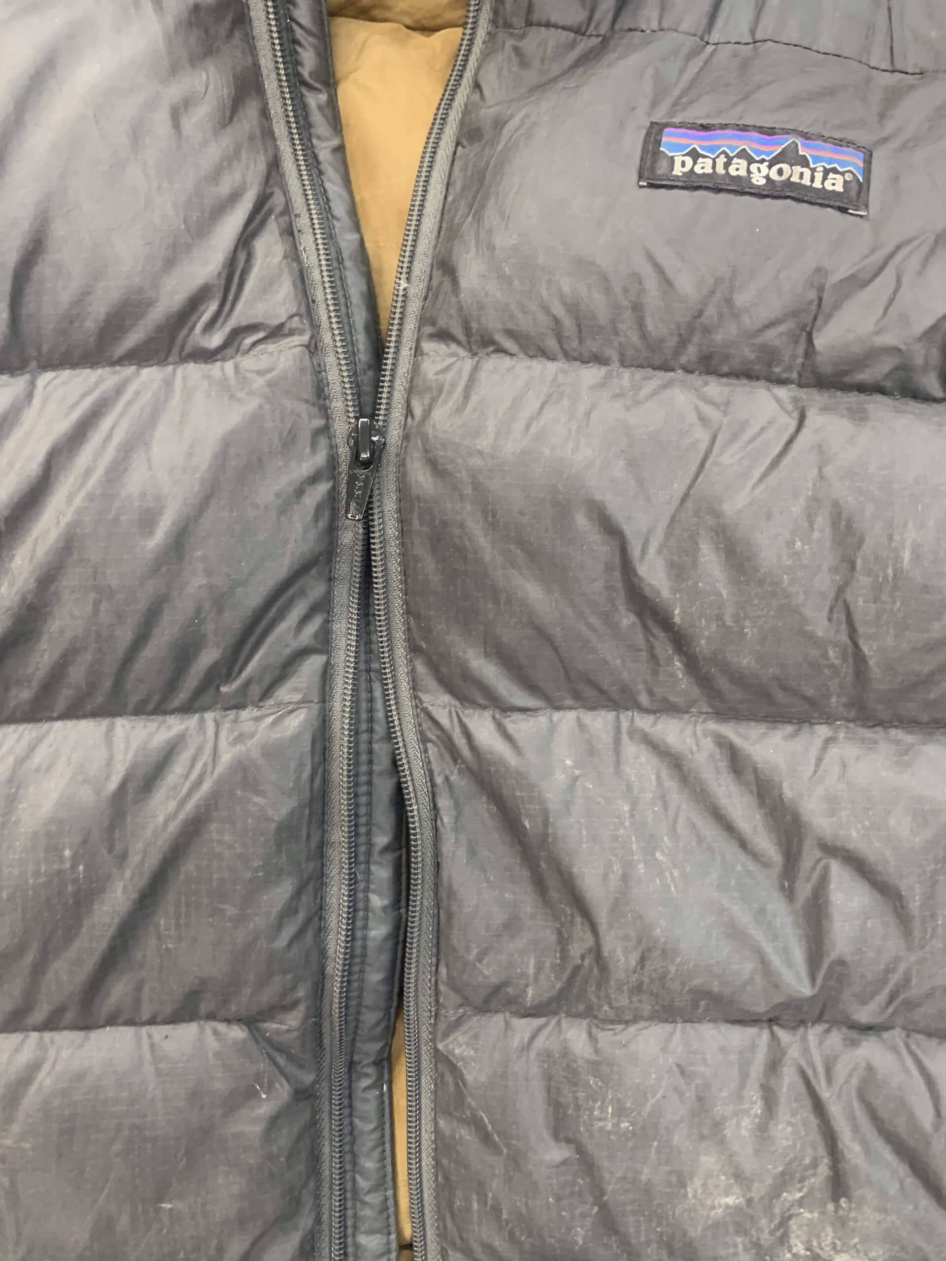 How to replace a Zipper closure on a puffer coat. 